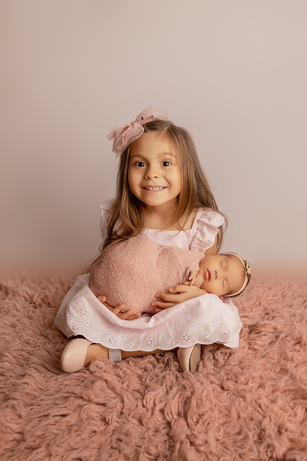 sibling with newborn portrait in pensacola